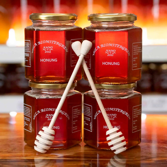 2 kg flytande honung med 2st honungspinnar och fri frakt för 538kr!